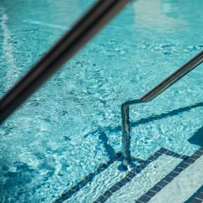 the water in a swimming pool with a