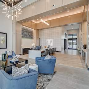 a living room with couches and a coffee table
