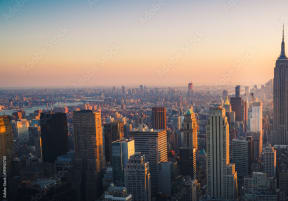 a sunset over the city of nyc and the empire state building at Clinton Towers, Bronx, NY, 10457