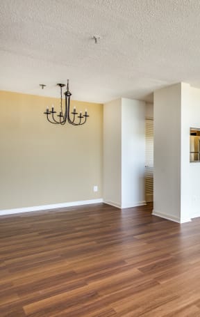 A living room with a fireplace and a balcony Residences at Rio in Gaithersburg, MD 20878