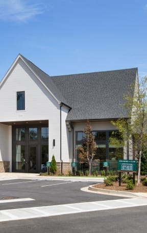 the exterior of a building with a street in front of it