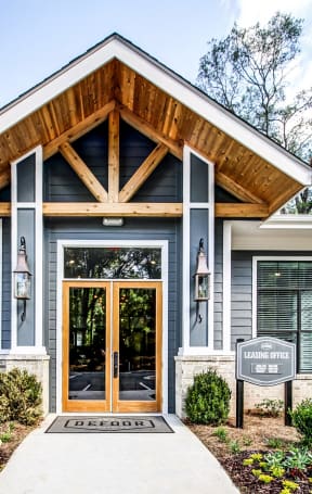 the front door of a home with a welcoming porch