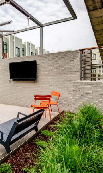 Courtyard Sitting With Shades and TV at 2100 Acklen Flats, Nashville, TN, 37212