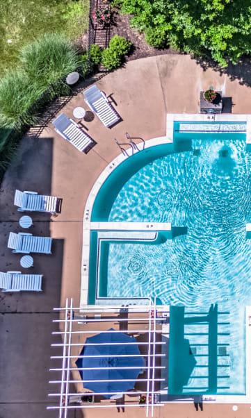 Seasonal pool and tanning deck within steps from your apartment backdoor. Enjoy luscious green space and the beauty of nature every day at Alexander Heights.