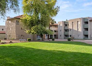 Apartment buildings and shared grounds at Villa Toscana