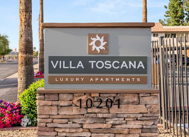 Apartment buildings and shared grounds at Villa Toscana