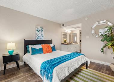 Furnished model bedroom at Villa Toscana
