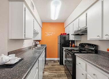 Kitchen counters, cabinetry and appliances at Villa Toscana