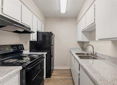 Kitchen counters, cabinetry and appliances at Villa Toscana