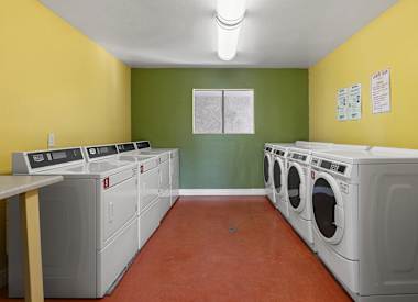 Shared laundry facility at Villa Toscana