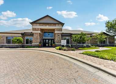 Las Brisas Apartments clubhouse exterior entrance - Round Rock, TX