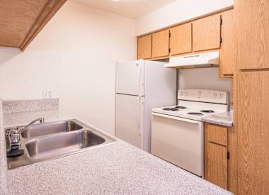 Apartment kitchen at Boulder Creek Apartments.