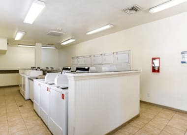 Shared laundry room at Boulder Creek Apartments.