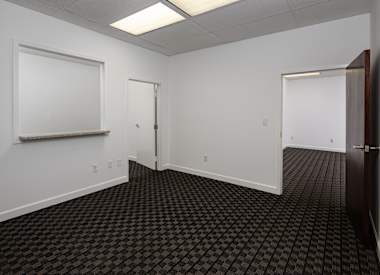A room with a black and white checkered floor.