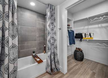 Apartment bathroom at Aura Uptown.