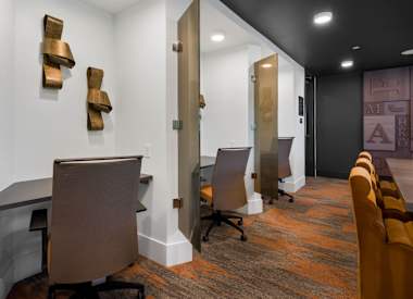 Shared workspaces at Aura Uptown.