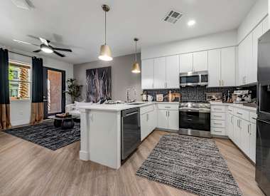 Apartment kitchen at Aura Uptown.