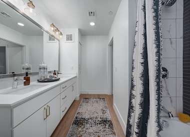 Apartment bathroom at Aura Uptown.