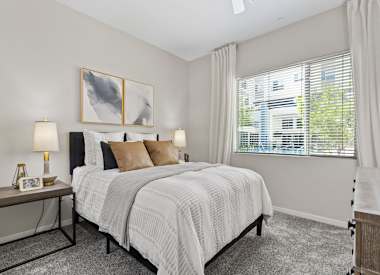 Furnished bedroom shown at Axis Camelback.