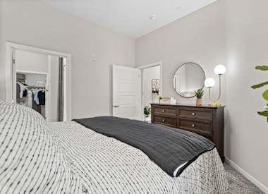 Furnished bedroom shown at Axis Camelback.
