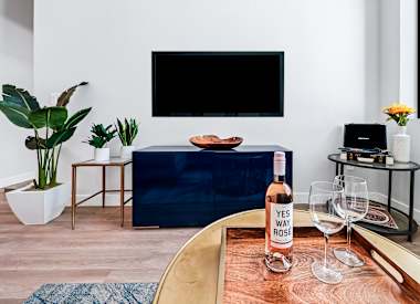 Furnished apartment living area shown at Union at Roosevelt I and II.