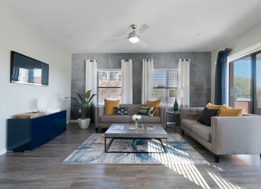 Furnished apartment living area shown at Union at Roosevelt I and II.