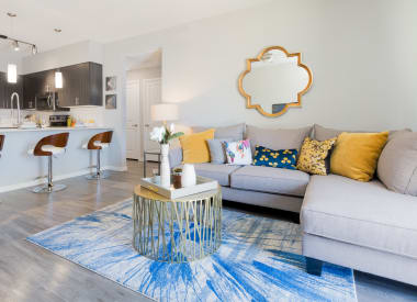 Furnished apartment living area shown at Union at Roosevelt I and II.