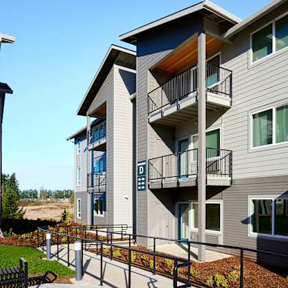 a view of a building with stairs in front of it