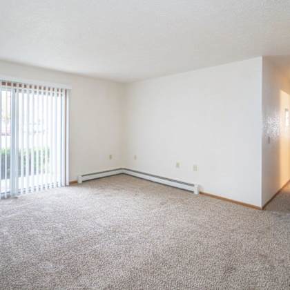 living room crawford apartments, 8640 independence ave, port austin, mi 48467