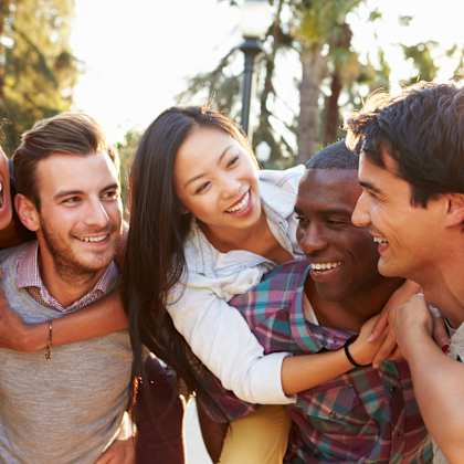 a group of friends posing for a picture together