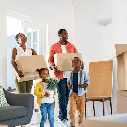 a family of four is moving into a new home.