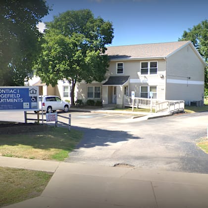 a building with a sign in front of it