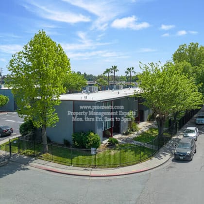 a building with a sign that says property management expertise.