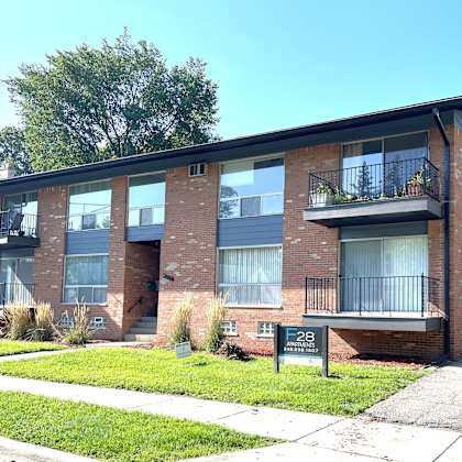a brick apartment building with balconies