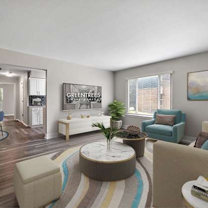 a living room with a sofa, chairs, and a coffee table.