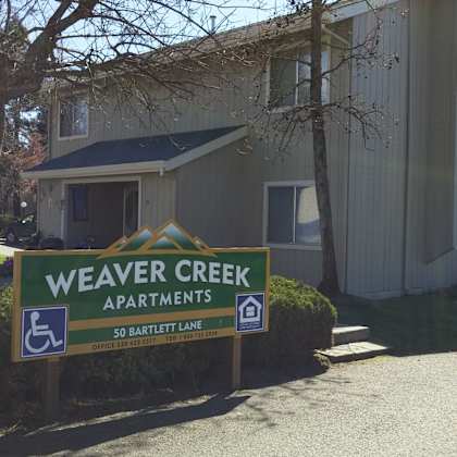 sign for weaver creek apts.