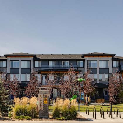 a large apartment building with a sign that says