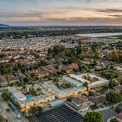 aerial view of residential property at dusk at shorehaven townhomes apartments, ventura, ca