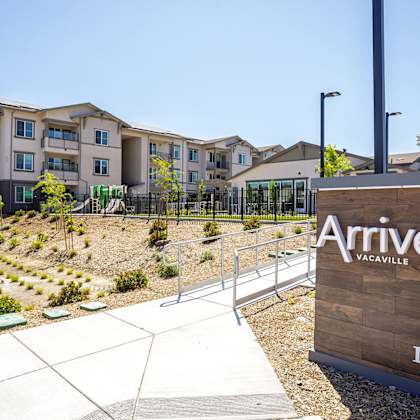 monument sign with arrive vacaville in the background