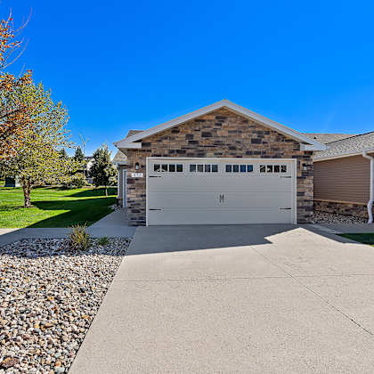 a house with a garage and a driveway.