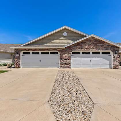 a house with a garage and a driveway.