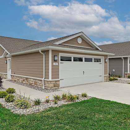 a house with a garage and a driveway.