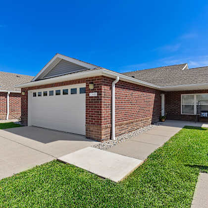 a house with a garage and a driveway.