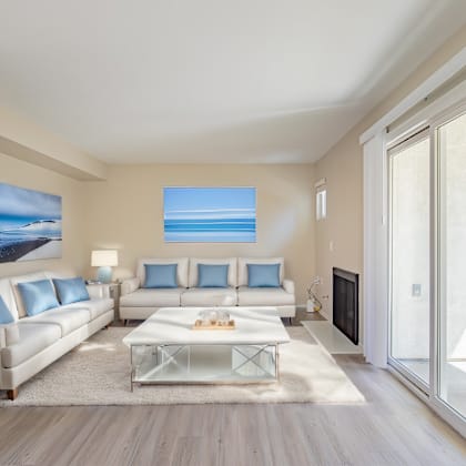 a living room with a couch and a coffee table
