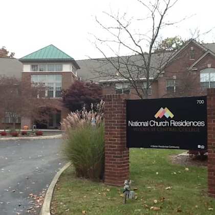 the sign in front of the building says national church residences.