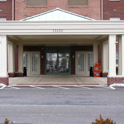 the front of a building with the number 15150 on it.