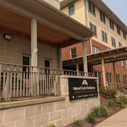 a building with a sign that reads "neal culver residence hall" is shown.