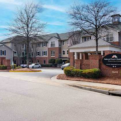 the image shows a street view of the national church residences pinecrest community with a sign that reads "3663".