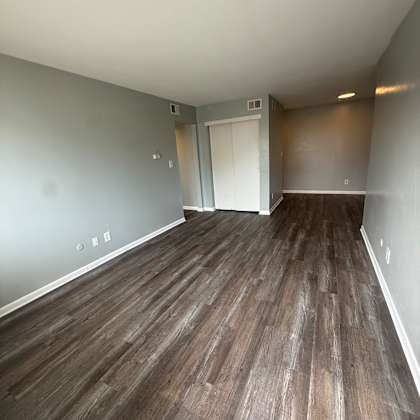 a wall of wood paneling runs along the wall.