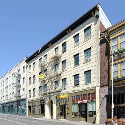 a building on the corner of a city street
